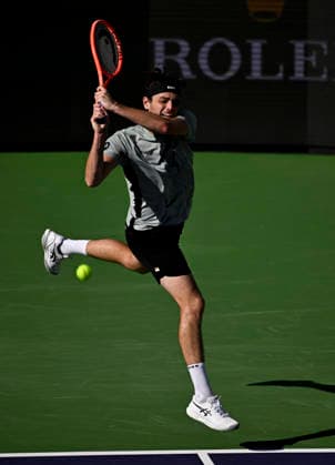 March 09, 2026 Taylor Fritz returns a shot against Alex Michelsen during their third round match at the BNP Paribas Open held at the Indian Wells Tennis Garden in Indian Wells, California. California. Mandatory Photo Credit : CSM Indian Wells United States of America - ZUMAc04_ 20260309_zma_c04_220 Copyright: xCharlesxBausx
