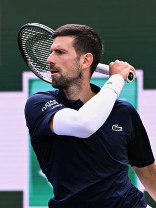 INDIAN WELLS, CA - MARCH 09: Novak Djokovic (SRB) looks down court after hitting the ball during an ATP, Tennis Herren tennis match during the BNP Paribas Open played on March 9, 2026 at the Indian Wells Tennis Garden in Indian Wells, CA. (Photo by John Cordes Icon Sportswire) TENNIS: MAR 09 BNP Paribas Open EDITORIAL USE ONLY Icon506260309024