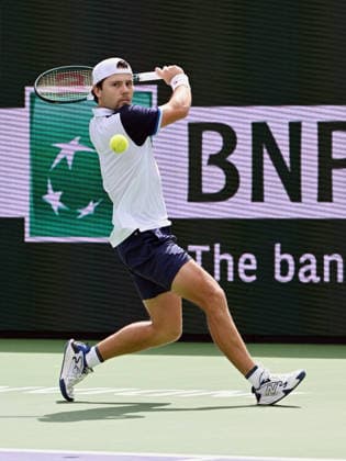 INDIAN WELLS, CA - MARCH 09: Aleksander Kovacevic (USA) returns the ball during an ATP, Tennis Herren tennis match during the BNP Paribas Open played on March 9, 2026 at the Indian Wells Tennis Garden in Indian Wells, CA. (Photo by John Cordes Icon Sportswire) TENNIS: MAR 09 BNP Paribas Open EDITORIAL USE ONLY Icon506260309033
