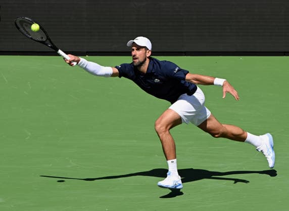 INDIAN WELLS, CA - MARCH 09: Novak Djokovic (SRB) returns the ball during an ATP, Tennis Herren tennis match during the BNP Paribas Open played on March 9, 2026 at the Indian Wells Tennis Garden in Indian Wells, CA. (Photo by John Cordes Icon Sportswire) TENNIS: MAR 09 BNP Paribas Open EDITORIAL USE ONLY Icon506260309044