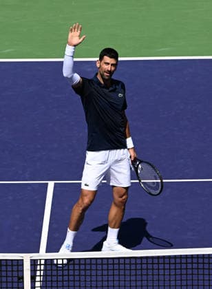 INDIAN WELLS, CA - MARCH 09: Novak Djokovic (SRB) waves to the fans after winning an ATP, Tennis Herren tennis match during the BNP Paribas Open played on March 9, 2026 at the Indian Wells Tennis Garden in Indian Wells, CA. (Photo by John Cordes Icon Sportswire) TENNIS: MAR 09 BNP Paribas Open EDITORIAL USE ONLY Icon506260309046