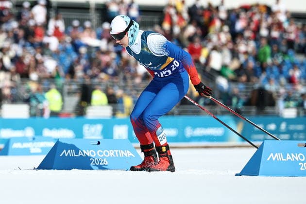 ITALY, TESERO - MARCH 10, 2026: Anastasia Bagiian of Russia competes in a women s para cross-country skiing classic vision impaired sprint at Tesero Cross-Country Stadium during the 2026 Winter Paralympic Games. Mikhail Tereshchenko TASS  89844103