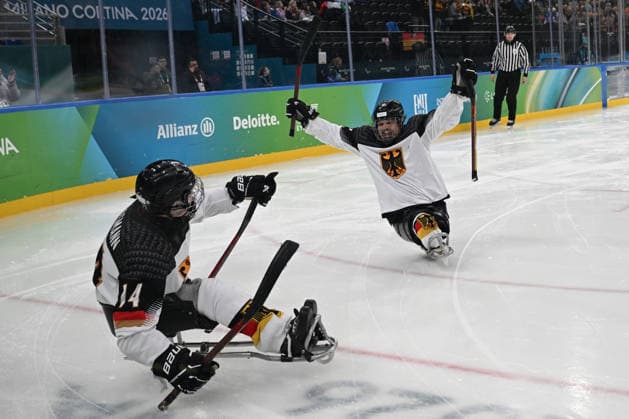 Para Ice hockey, Eishockey - Millano Cortina 2026 Winter Paralympics: Day 4 Para Ice Hockey - Milano Cortina 2026 Winter Paralympics: Day 4 MILANO SANTAGIULIA ICE HOCKEY ARENA MILANO, ITALY - MARCH 10: Preliminary Round - Group A Italy - Germany First goal by BUSSMANN Jano (No. 14, Athlet, Forward, 09.03.2007, Club Wiehl Penguins). Teammate WEDDE Joerg (No. 77, Athlet, Forward, 18.08.1965, Club Hannover Ice Lions) is sheering up with him. Impressions of Team Para Ice Hockey Germany playing Team ITA at March 10 at the Milano Cortina 2026 Winter Paralympics Para Ice Hockey Tournament in the Milano Santagiulia Ice Hockey Arena at day 4. (Photo by RALF KUCKUCK) Copyright 2026 Ralf Kuckuck Milano Milano Santagiulia Ice Hockey Arena Italy