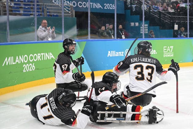 Para Ice hockey, Eishockey - Millano Cortina 2026 Winter Paralympics: Day 4 Para Ice Hockey - Milano Cortina 2026 Winter Paralympics: Day 4 MILANO SANTAGIULIA ICE HOCKEY ARENA MILANO, ITALY - MARCH 10: Preliminary Round - Group A Italy - Germany Celebrating the first goal. KUHLI-LAUENSTEIN Ingo (No. 33, Athlet, Defender, 20.05.1992, Club Wiehl Penguins), SCHRADER Felix (No. 97, Athlet, Forward, 01.03.1997, Club Hannover Ice Lions), KUHLI-LAUENSTEIN Ingo (No. 33, Athlet, Defender, 20.05.1992, Club Wiehl Penguins) and BUSSMANN Jano (No. 14, Athlet, Forward, 09.03.2007, Club Wiehl Penguins) Impressions of Team Para Ice Hockey Germany playing Team ITA at March 10 at the Milano Cortina 2026 Winter Paralympics Para Ice Hockey Tournament in the Milano Santagiulia Ice Hockey Arena at day 4. (Photo by RALF KUCKUCK) Copyright 2026 Ralf Kuckuck Milano Milano Santagiulia Ice Hockey Arena Italy