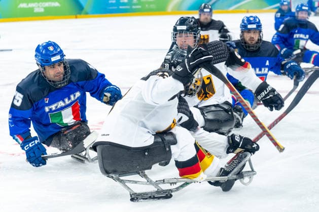 Para Ice hockey, Eishockey - Millano Cortina 2026 Winter Paralympics: Day 4 Para Ice Hockey - Milano Cortina 2026 Winter Paralympics: Day 4 MILANO SANTAGIULIA ICE HOCKEY ARENA MILANO, ITALY - MARCH 10: Preliminary Round - Group A Italy - Germany KUHLI-LAUENSTEIN Ingo (No. 33, Athlet, Defender, 20.05.1992, Club Wiehl Penguins) and SCHRADER Felix (No. 97, Athlet, Forward, 01.03.1997, Club Hannover Ice Lions) Impressions of Team Para Ice Hockey Germany playing Team ITA at March 10 at the Milano Cortina 2026 Winter Paralympics Para Ice Hockey Tournament in the Milano Santagiulia Ice Hockey Arena at day 4. (Photo by RALF KUCKUCK) Copyright 2026 Ralf Kuckuck