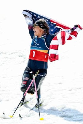 ITALY, TESERO - MARCH 10, 2026: Oksana Masters of the USA celebrates winning a women s para cross-country skiing sitting sprint final at Tesero Cross-Country Stadium during the 2026 Winter Paralympic Games. Mikhail Tereshchenko TASS  89846995