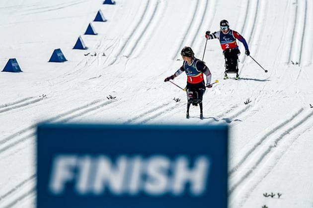 ITALY, TESERO - MARCH 10, 2026: Oksana Masters (L) of the USA and Yunji Kim of South Korea compete in a women s para cross-country skiing sitting sprint final at Tesero Cross-Country Stadium during the 2026 Winter Paralympic Games 2026 Winter Paralympics: Para Cross-Country Skiing  - ZUMAt113 20260310_zaa_t113_139 Copyright: xMikhailxTereshchenkox