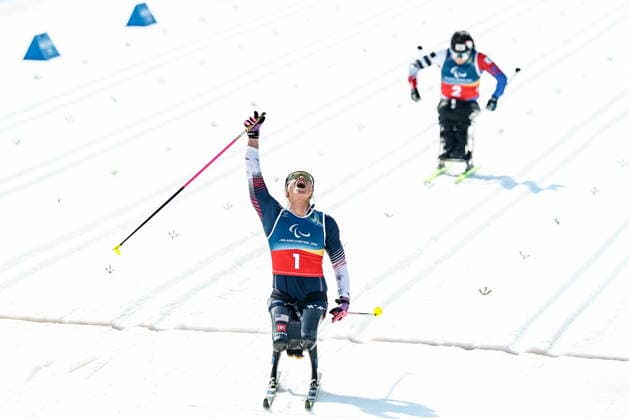 ITALY, TESERO - MARCH 10, 2026: Oksana Masters (L) of the USA and Yunji Kim of South Korea finish a women s para cross-country skiing sitting sprint final at Tesero Cross-Country Stadium during the 2026 Winter Paralympic Games 2026 Winter Paralympics: Para Cross-Country Skiing  - ZUMAt113 20260310_zaa_t113_140 Copyright: xMikhailxTereshchenkox