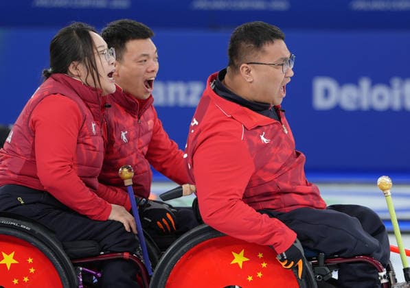 (260310) -- CORTINA D AMPEZZO, March 10, 2026 -- Athletes of China react during the wheelchair curling mixed team round robin session 7 match between China and Canada at the Milan-Cortina 2026 Paralympic Winter games, Winterspiele,Spiele, Summer games in Cortina D ampezzo, Italy, March 10, 2026. ) (SP)ITALY-CORTINA D AMPEZZO-PARALYMPIC WINTER GAMES-WHEELCHAIR CURLING-MIXED TEAM-ROUND ROBIN-CHN VS CAN CaixYang 