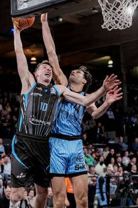 Germany easyCredit BBL, Main Round 2025 26, 26 Matchday Veolia Towers Hamburg vs Science City Jena Inselpark Arena Hamburg Joe Wieskamp Science City Jena, 10 , Benedikt Turudic Veolia Towers Hamburg, 44 , Fight under the basket, lay-up basketball Copyright: xStefanxTrochax