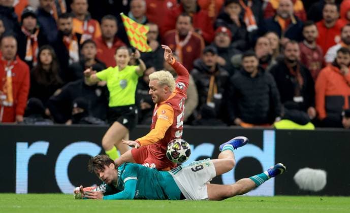 Milos Kerkez of Liverpool is fouled by Baris Alper Yilmaz of Galatasaray Galatasaray v Liverpool, UEFA Champions League, Round of 16, First Leg, Football, RAMS Park, Istanbul, Turkiye - 10 Mar 2026Istanbul RAMS Park Turkey EDITORIAL USE ONLY No use with unauthorised audio, video, data, fixture lists, club league logos or live services. Online in-match use limited to 120 images, no video emulation. No use in betting, games or single club league player publications. Copyright: xGeorgexTewkesbury Shutterstockx 16740258ar