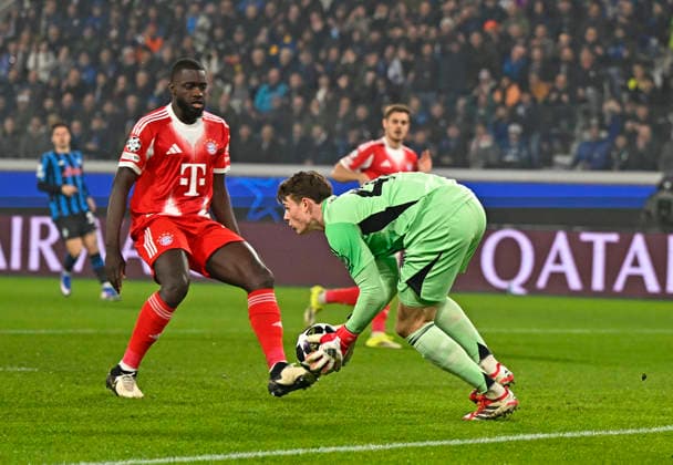 10 03 2026, Football UEFA Championsleague 2025 2026 Round of 16, Atalanta Bergamo FC Bayern Munich, in the New Balance Arena Bergamo, Italy , f l Dayot Upamecano FC Bayern Munich and goalkeeper Jonas Urbig FC Bayern Munich DFL and DFB regulations prohibit any use of photographs as image sequences and or quasi video