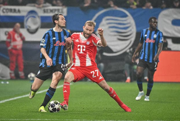 FOOTBALL CHAMPIONS LEAGUE SEASON 2025 2026 Round of 16 first leg 10 03 2026 Atalanta Bergamo FC Bayern Muenchen Konrad Laimer right, FC Bayern Muenchen vs Marten de Roon left, Atalanta Bergamo