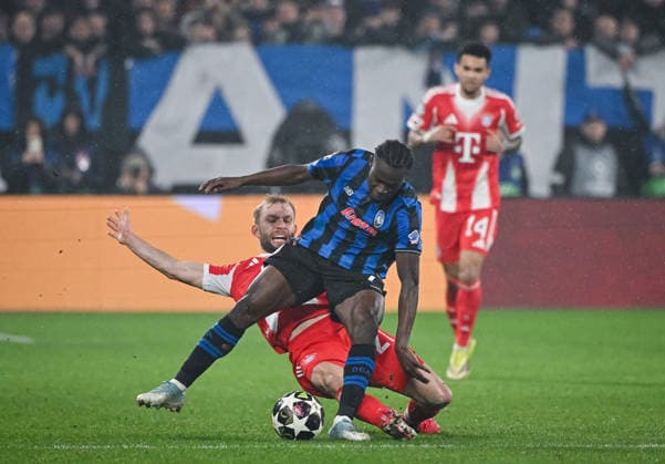 FOOTBALL CHAMPIONS LEAGUE SEASON 2025 2026 Round of 16 first leg 10 03 2026 Atalanta Bergamo FC Bayern Muenchen Konrad Laimer back, FC Bayern Muenchen v Kamaldeen Sulemana front, Atalanta Bergamo