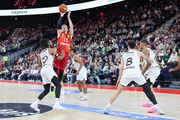 Andreas Obst FC Bayern Basketball, 13 with ball with Chip Flanigan Basketball Loewen Braunschweig, 30 and Joshua Obiesie Basketball Loewen Braunschweig, 08 , GER, FC Bayern Basketball vs Basketball Loewen Braunschweig, Basketball, easycredit Basketball Bundesliga, 25 Matchday, Season 2025 2026, 10 03 2026, GER, FC Bayern Basketball vs Basketball Loewen Braunschweig, Basketball, easycredit Basketball Bundesliga, 25 Matchday, Season 2025 2026, 10 03 2026 Muenchen Copyright: xEibner-Pressefoto JennixMaulx EP_JML