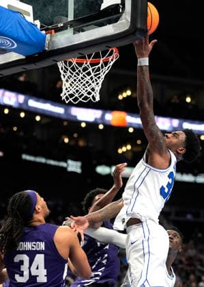 MAR 10 2026: BYU Cougars guard Kennard Davis Jr. (30) scores over Kansas State Wildcats guard Nate Johnson (34) in the Big 12 Championship Tournament at T-Mobile center, Kansas City, Missouri. CSM. Kansas City United States - ZUMAc04_ 20260310_zma_c04_130 Copyright: xJonxRobichaudx