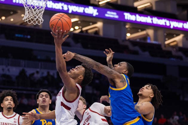 March 10, 2026: Stanford Cardinal guard Ebuka Okorie (1) shoots the ball against Pittsburgh Panthers guard Damarco Minor (7) during the second half of the 2025 ACC Men s Baskeetball Championship at Spectrum Center in Charlotte, NC. ( ) Charlotte United States - ZUMAc04_ 20260310_zma_c04_135 Copyright: xScottxKinserx