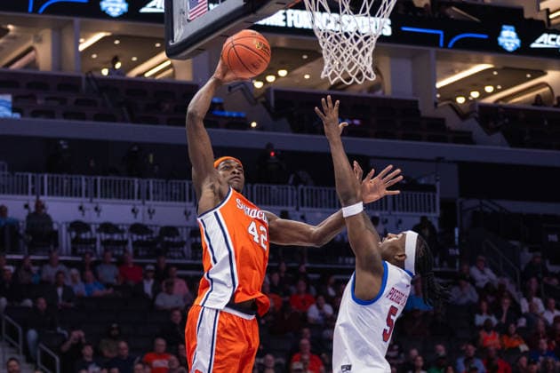 March 10, 2026: Syracuse Orange forward William Kyle III (42) goes to the basket against SMU Mustangs guard Jaron Pierre Jr. (5) during the first half of the 2025 ACC Men s Baskeetball Championship at Spectrum Center in Charlotte, NC. ( ) Charlotte United States - ZUMAc04_ 20260310_zma_c04_139 Copyright: xScottxKinserx