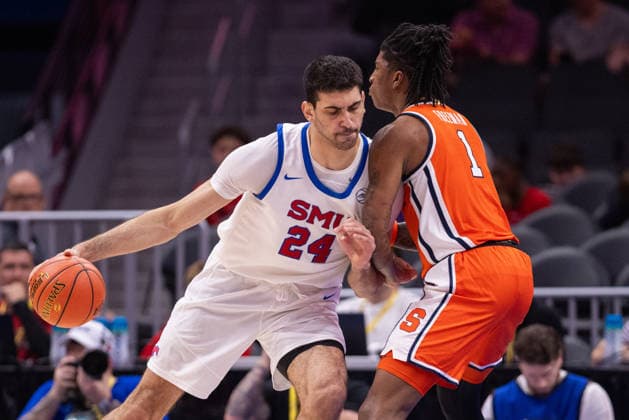 March 10, 2026: SMU Mustangs center Samet Yigitoglu (24) posts up against Syracuse Orange forward Donnie Freeman (1) during the first half of the 2025 ACC Men s Baskeetball Championship at Spectrum Center in Charlotte, NC. ( ) Charlotte United States - ZUMAc04_ 20260310_zma_c04_155 Copyright: xScottxKinserx