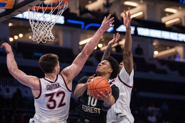 March 10, 2026: Wake Forest Demon Deacons guard Sebastian Akins (10) shoots the ball against Virginia Tech Hokies center Christian Gurdak (32) during the first half of the 2025 ACC Men s Baskeetball Championship at Spectrum Center in Charlotte, NC. ( ) Charlotte United States - ZUMAc04_ 20260310_zma_c04_158 Copyright: xScottxKinserx
