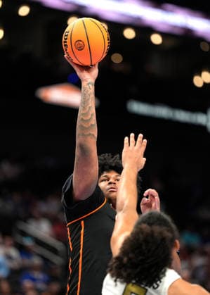 MAR 10 2026: Oklahoma State Cowboys center Mekhi Ragland (13) scores over Colorado Buffaloes guard Josiah Sanders (5) in the Big 12 Championship Tournament at T-Mobile center, Kansas City, Missouri. CSM. Kansas City United States - ZUMAc04_ 20260310_zma_c04_205 Copyright: xJonxRobichaudx