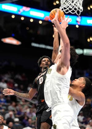 NCAA, College League, USA Basketball 2026: OSU Vs Colorado Big 12 Tournament MAR 10 2026: Oklahoma State Cowboys guard Jaylen Curry (0)scores against Kansas State Wildcats guard CJ Jones (3) in the Big 12 Championship Tournament at T-Mobile center, Kansas City, Missouri. Jon Robichaud CSM. (Credit Image: Â Jon Robichaud Cal Media) Kansas City Missouri United States EDITORIAL USE ONLY Copyright: xx ZUMA-20260310_zma_c04_207.jpg JonxRobichaudx csmphotothree479353