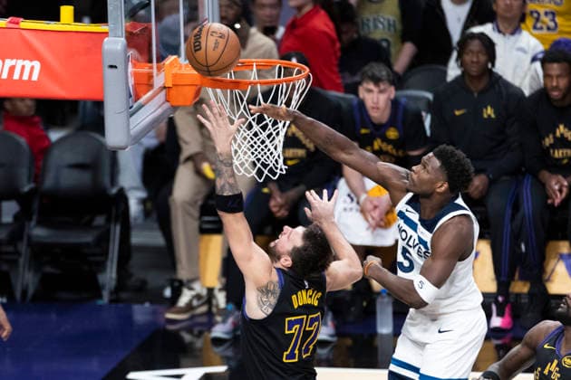 March 10, 2026, Los Angeles, California, USA: Los Angeles LakersÃ¢â‚¬â ¢ Luka DonÄÂiÄ¡ (77) goes to the basket under pressure from Minnesota TimberwolvesÃ¢â‚¬â ¢ Anthony Edwards (5) during an NBA, Basketball Herren, USA basketball game at Crypto.com Arena on Tuesday, March 10, 2026 in Los Angeles. NBA 2026: Timberwolves Vs Lakers  - ZUMAc68_ 20260310_zaf_c68_039 Copyright: xRingoxChiux