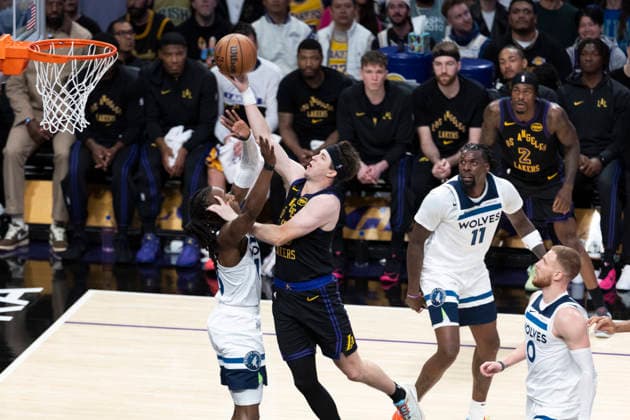 March 10, 2026, Los Angeles, California, USA: Los Angeles LakersÃ¢â‚¬â ¢ Austin Reaves (15) goes to the basket against Minnesota TimberwolvesÃ¢â‚¬â ¢ Bones Hyland (8) during an NBA, Basketball Herren, USA basketball game at Crypto.com Arena on Tuesday, March 10, 2026 in Los Angeles. NBA 2026: Timberwolves Vs Lakers  - ZUMAc68_ 20260310_zaf_c68_062 Copyright: xRingoxChiux