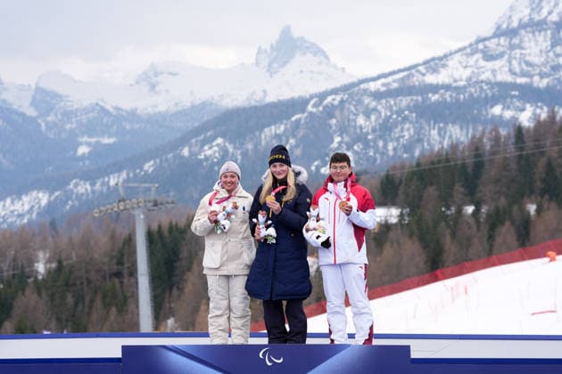 (260311) -- CORTINA D AMPEZZO, March 11, 2026 -- Gold medalist Ebba Aarsjoe (C) of Sweden, silver medalist Aurelie Richard (L) of France, and bronze medalist Zhu Wenjing of China attend the awarding ceremony for the para alpine skiing women s combined standing event at the Milan-Cortina 2026 Paralympic Winter games, Winterspiele,Spiele, Summer games in Cortina D ampezzo, Italy, March 10, 2026. ) (SP)ITALY-CORTINA D AMPEZZO-PARALYMPIC WINTER GAMES-PARA ALPINE SKIING-WOMEN S COMBINED-STANDING LianxYi 