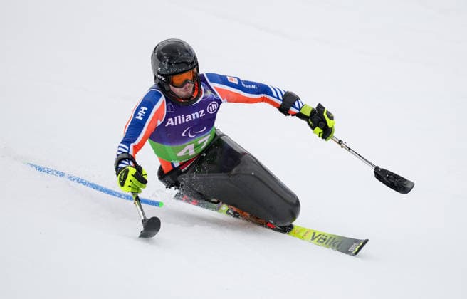(260311) -- CORTINA D AMPEZZO, March 11, 2026 -- Jeroen Kampschreur of the Netherlands competes during the Para Alpine Skiing Men s Alpine Combined Sitting event at the Milan-Cortina 2026 Paralympic Winter games, Winterspiele,Spiele, Summer games in Cortina D ampezzo, Italy, March 10, 2026. ) (SP)ITALY-CORTINA D AMPEZZO-PARALYMPIC WINTER GAMES-PARA ALPINE SKIING-MEN S ALPINE COMBINED-SITTING WangxKaiyan 