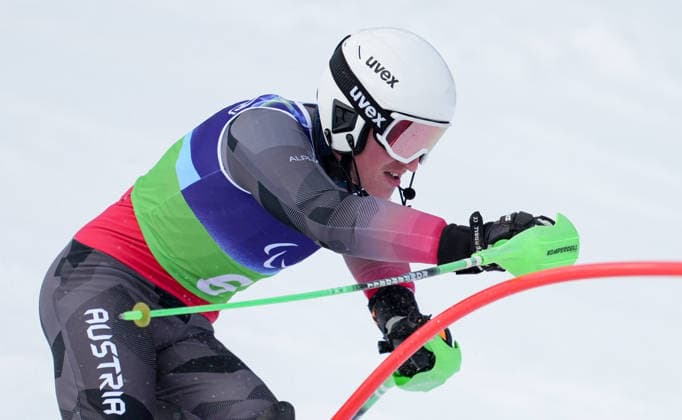 (260311) -- CORTINA D AMPEZZO, March 11, 2026 -- Johannes Aigner of Austria competes during the Para Alpine Skiing Men s Alpine Combined Vision Impaired event at the Milan-Cortina 2026 Paralympic Winter games, Winterspiele,Spiele, Summer games in Cortina D ampezzo, Italy, March 10, 2026. ) (SP)ITALY-CORTINA D AMPEZZO-PARALYMPIC WINTER GAMES-PARA ALPINE SKIING-MEN S ALPINE COMBINED-VISION IMPAIRED WangxKaiyan 
