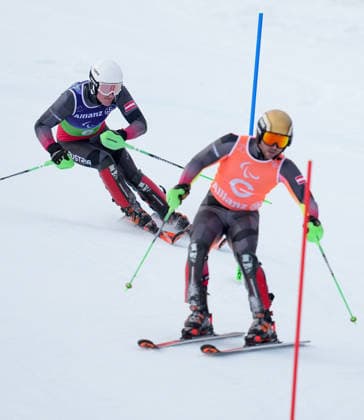 (260311) -- CORTINA D AMPEZZO, March 11, 2026 -- Johannes Aigner (L) and his guide Nico Haberl of Austria compete during the Para Alpine Skiing Men s Alpine Combined Vision Impaired event at the Milan-Cortina 2026 Paralympic Winter games, Winterspiele,Spiele, Summer games in Cortina D ampezzo, Italy, March 10, 2026. ) (SP)ITALY-CORTINA D AMPEZZO-PARALYMPIC WINTER GAMES-PARA ALPINE SKIING-MEN S ALPINE COMBINED-VISION IMPAIRED WangxKaiyan 