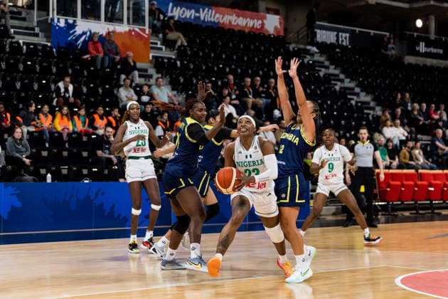 LYON-VILLEURBANNE, FRANCE - MARCH 11: Ezinne Kalu (Nigeria, 23) controls the ball against Jenifer Munoz (Colombia, 12) during the FIBA Women™s World Cup Qualifying Tournament match between Nigeria vs. Colombia at Astroballe on matchday 1 of the FIBA Women™s World Cup Qualifying Tournament on March 11, 2026 in Lyon-Villeurbanne, France. France Copyright: xSteffiexWunderlx
