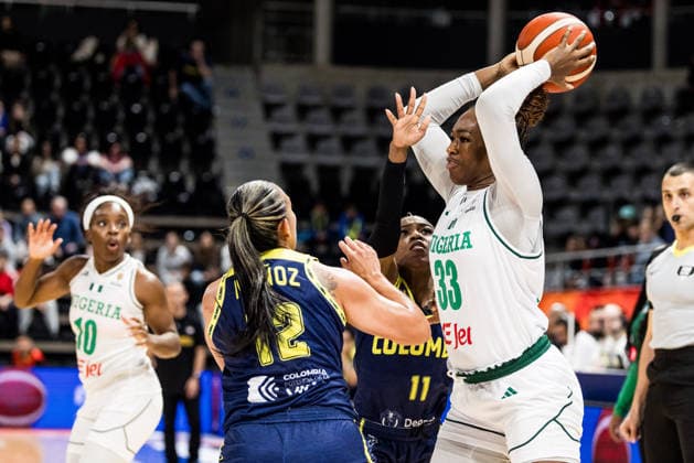 LYON-VILLEURBANNE, FRANCE - MARCH 11: Nicole Enabosi (Nigeria, 33) controls the ball against Jenifer Munoz (Colombia, 12) during the FIBA Women™s World Cup Qualifying Tournament match between Nigeria vs. Colombia at Astroballe on matchday 1 of the FIBA Women™s World Cup Qualifying Tournament on March 11, 2026 in Lyon-Villeurbanne, France. France Copyright: xSteffiexWunderlx