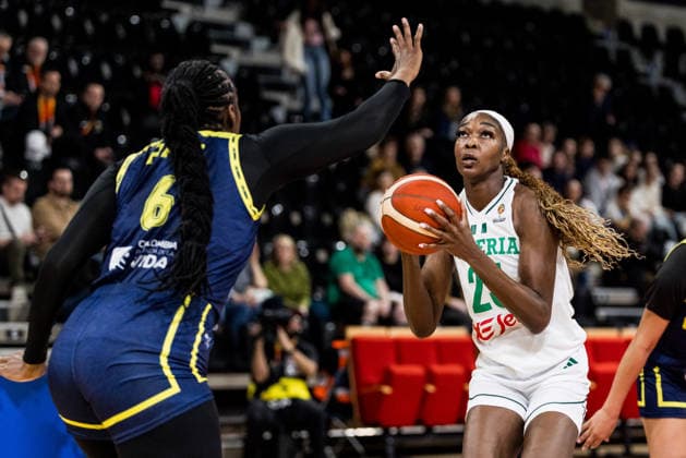 LYON-VILLEURBANNE, FRANCE - MARCH 11: Victoria Macaulay (Nigeria, 25) controls the ball against Yuliany Paz (Colombia, 6) during the FIBA Women™s World Cup Qualifying Tournament match between Nigeria vs. Colombia at Astroballe on matchday 1 of the FIBA Women™s World Cup Qualifying Tournament on March 11, 2026 in Lyon-Villeurbanne, France. France Copyright: xSteffiexWunderlx