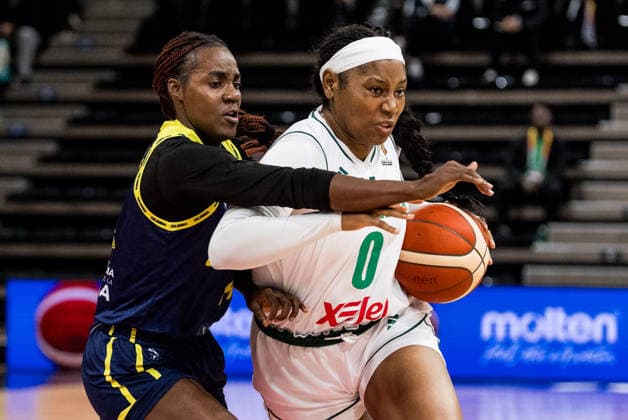 LYON-VILLEURBANNE, FRANCE - MARCH 11: Amy Okonkwo (Nigeria, 0) controls the ball against Marlyn Vente (Colombia, 14) during the FIBA Women™s World Cup Qualifying Tournament match between Nigeria vs. Colombia at Astroballe on matchday 1 of the FIBA Women™s World Cup Qualifying Tournament on March 11, 2026 in Lyon-Villeurbanne, France. France Copyright: xSteffiexWunderlx