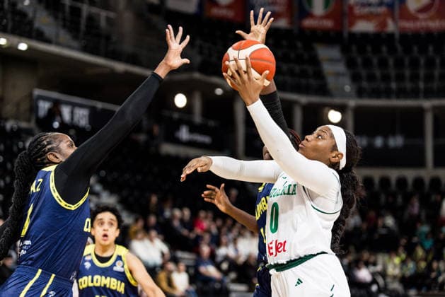 LYON-VILLEURBANNE, FRANCE - MARCH 11: Amy Okonkwo (Nigeria, 0) controls the ball against Yuliany Paz (Colombia, 6) during the FIBA Women™s World Cup Qualifying Tournament match between Nigeria vs. Colombia at Astroballe on matchday 1 of the FIBA Women™s World Cup Qualifying Tournament on March 11, 2026 in Lyon-Villeurbanne, France. France Copyright: xSteffiexWunderlx