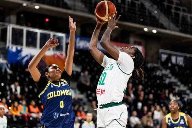 LYON-VILLEURBANNE, FRANCE - MARCH 11: Rita Igbokwe (Nigeria, 32) controls the ball against Marta Moscarella (Colombia, 0) during the FIBA Women™s World Cup Qualifying Tournament match between Nigeria vs. Colombia at Astroballe on matchday 1 of the FIBA Women™s World Cup Qualifying Tournament on March 11, 2026 in Lyon-Villeurbanne, France. France Copyright: xSteffiexWunderlx