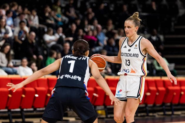 LYON-VILLEURBANNE, FRANCE - MARCH 11: Leonie Fiebich (Germany, 13) controls the ball against Jihyun Park (Republic of Korea, 1) during the FIBA Women™s World Cup Qualifying Tournament match between Germany vs. Republic of Korea at Astroballe on matchday 1 of the FIBA Women™s World Cup Qualifying Tournament on March 11, 2026 in Lyon-Villeurbanne, France. France Copyright: xSteffiexWunderlx