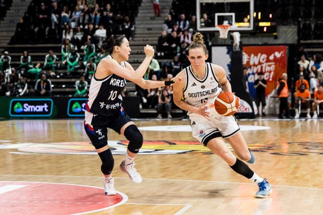 LYON-VILLEURBANNE, FRANCE - MARCH 11: Leonie Fiebich (Germany, 13) controls the ball against Yoolim Kang (Republic of Korea, 10) during the FIBA Women™s World Cup Qualifying Tournament match between Germany vs. Republic of Korea at Astroballe on matchday 1 of the FIBA Women™s World Cup Qualifying Tournament on March 11, 2026 in Lyon-Villeurbanne, France. France Copyright: xSteffiexWunderlx