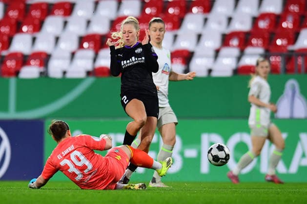 Soccer Women DFB Cup Season 2025 2026 Quarterfinal SGS Essen Werder Bremen on 11 03 2026 at the stadium at Hafenstraße in Essen Mariella El Sherif Werder Bremen , bottom Jule Terlinden SGS Essen , middle Michelle Ulbrich Werder Bremen , back DFB regulations prohibit any use of photographs as image sequences and or quasi video Nordrhein Westfalen Germany