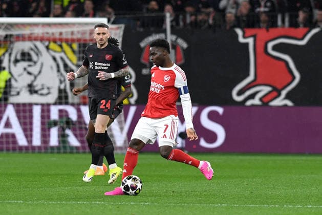 Aleix Garcia Bayer 04 Leverkusen and Bukayo Saka FC Arsenal battle for the ball during the UEFA Champions League 2025 26 Round of 16 First Leg First Leg match between Bayer 04 Leverkusen and FC Arsenal, BayArena on March 11, 2026 in Leverkusen, Germany, Germany Photo by Ralf Treese DeFodi Images Aleix Garcia Bayer 04 Leverkusen and Bukayo Saka FC Arsenal battle for the ball during the UEFA Champions League 2025 26 Round of 16, First Leg, match between Bayer 04 Leverkusen and FC Arsenal at BayArena on February 24, 2026 in Leverkusen, Germany Photo by Ralf Treese DeFodi Images