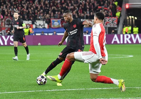 11 03 2026, xhbx, Football UEFA Champions League, Bayer 04 Leverkusen FC Arsenal London v l Christian Kofane Bayer Leverkusen , Gabriel Magalhaes Arsenal London FC DFL DFB REGULATIONS PROHIBIT ANY USE OF PHOTOGRAPHS as IMAGE SEQUENCES and or QUASI VIDEO Leverkusen