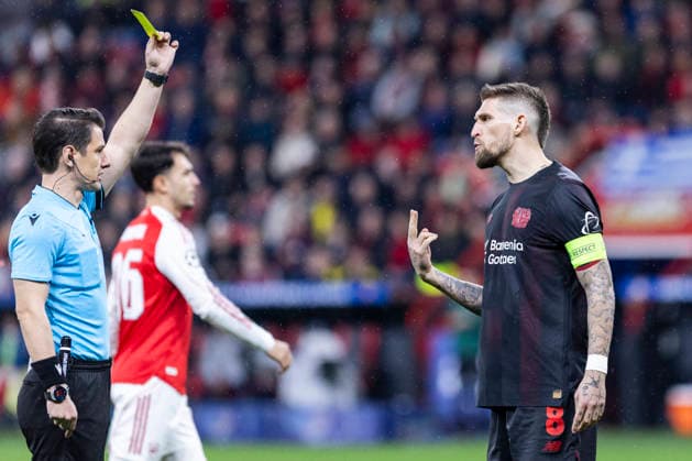 LEVERKUSEN, GERMANY - MARCH 11: Yellow card for Robert Andrich (Bayer 04 Leverkusen, 8) during the UEFA Champions League match between Bayer Leverkusen vs. FC Arsenal in the first leg of the round of 16 at BayArena on March 11th, 2026 in Leverkusen, Germany. NRW Germany Copyright: xBEAUTIFULxSPORTS JulianxMeuselx