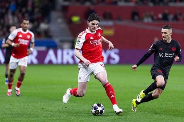 LEVERKUSEN, GERMANY - MARCH 11: Declan Rice (FC Arsenal, 41), Alejandro Grimaldo (Bayer 04 Leverkusen, 20) during the UEFA Champions League match between Bayer Leverkusen vs. FC Arsenal in the first leg of the round of 16 at BayArena on March 11th, 2026 in Leverkusen, Germany. NRW Germany Copyright: xBEAUTIFULxSPORTS JulianxMeuselx