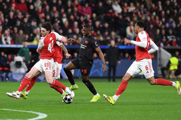Declan Rice FC Arsenal and Christian Kofane Bayer 04 Leverkusen battle for the ball during the UEFA Champions League 2025 26 Round of 16, First Leg match between Bayer 04 Leverkusen and FC Arsenal, BayArena on March 11, 2026 in Leverkusen, Germany, Germany Photo by Ralf Treese DeFodi Images Declan Rice FC Arsenal and Christian Kofane Bayer 04 Leverkusen battle for the ball during the UEFA Champions League 2025 26 Round of 16, First Leg, match between Bayer 04 Leverkusen and FC Arsenal at BayArena on February 24, 2026 in Leverkusen, Germany Photo by Ralf Treese DeFodi Images