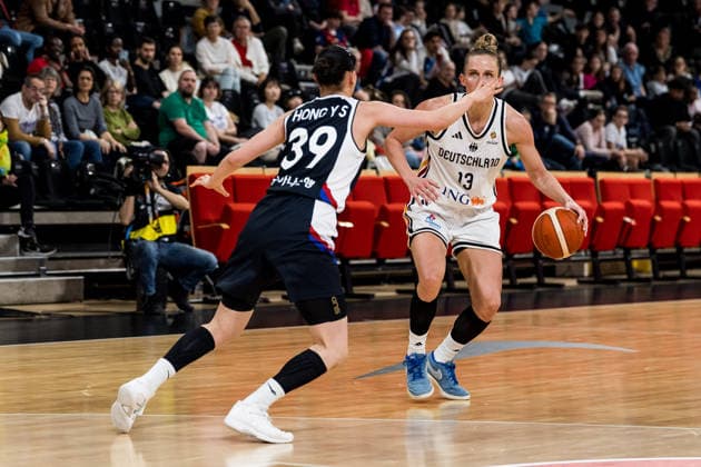 LYON-VILLEURBANNE, FRANCE - MARCH 11: Leonie Fiebich (Germany, 13) controls the ball against Yusun Hong (Republic of Korea, 39) during the FIBA Women™s World Cup Qualifying Tournament match between Germany vs. Republic of Korea at Astroballe on matchday 1 of the FIBA Women™s World Cup Qualifying Tournament on March 11, 2026 in Lyon-Villeurbanne, France. France Copyright: xSteffiexWunderlx