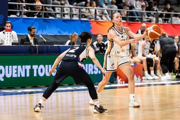 LYON-VILLEURBANNE, FRANCE - MARCH 11: Britta Daub (Germany, 19) controls the ball against Yeeun Heo (Republic of Korea, 2) during the FIBA Women™s World Cup Qualifying Tournament match between Germany vs. Republic of Korea at Astroballe on matchday 1 of the FIBA Women™s World Cup Qualifying Tournament on March 11, 2026 in Lyon-Villeurbanne, France. France Copyright: xSteffiexWunderlx