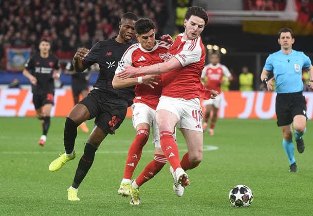 11 03 2026, xhbx, Football UEFA Champions League, Bayer 04 Leverkusen FC Arsenal London v l Christian Kofane Bayer Leverkusen , Piero Hincapie Arsenal London FC , Declan Rice Arsenal London FC DFL DFB REGULATIONS PROHIBIT ANY USE OF PHOTOGRAPHS as IMAGE SEQUENCES and or QUASI VIDEO Leverkusen