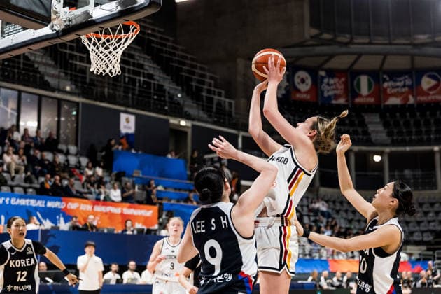 LYON-VILLEURBANNE, FRANCE - MARCH 11: Emily Bessoir (Germany, 22) shoots over Sohee Lee (Republic of Korea, 9) during the FIBA Women™s World Cup Qualifying Tournament match between Germany vs. Republic of Korea at Astroballe on matchday 1 of the FIBA Women™s World Cup Qualifying Tournament on March 11, 2026 in Lyon-Villeurbanne, France. France Copyright: xSteffiexWunderlx